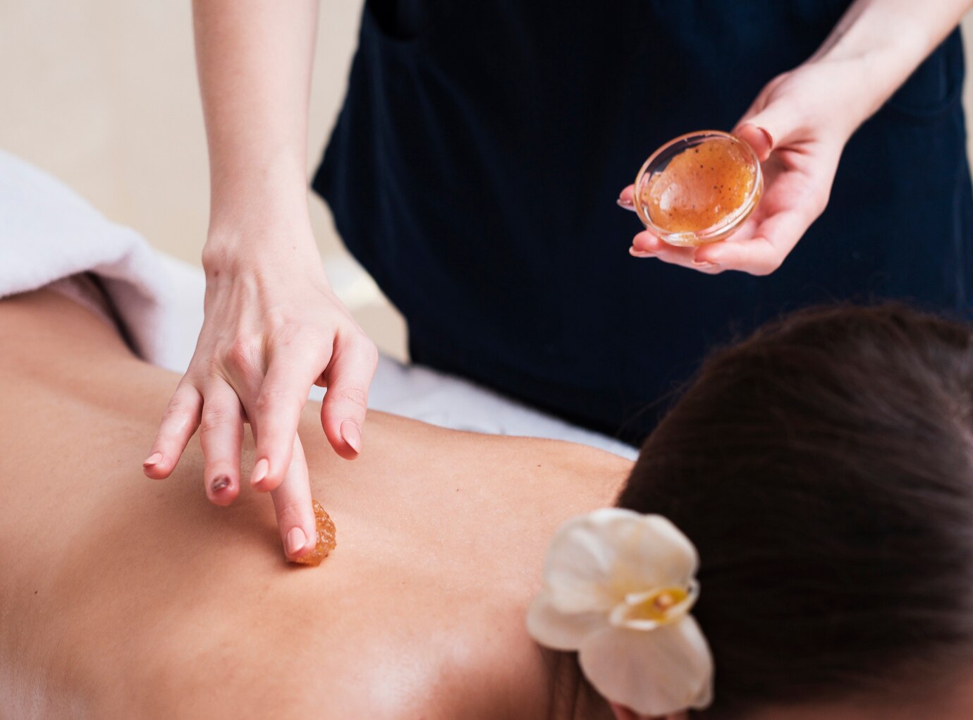 Ayurvedic red herbal paste application as part of traditional treatment at Mumbai spa